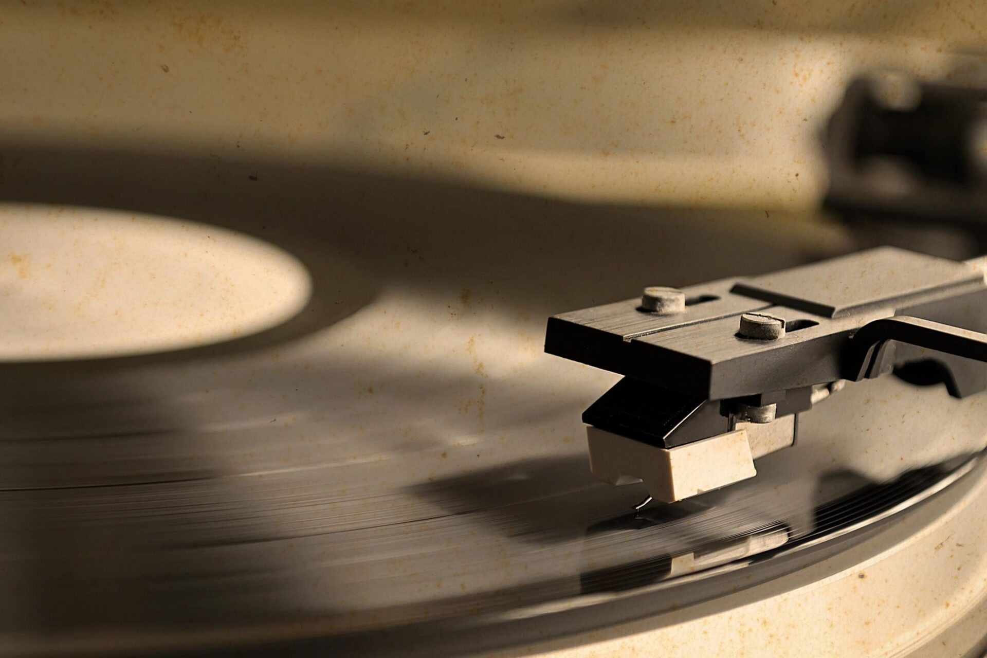 A record player playing an old fashioned record.